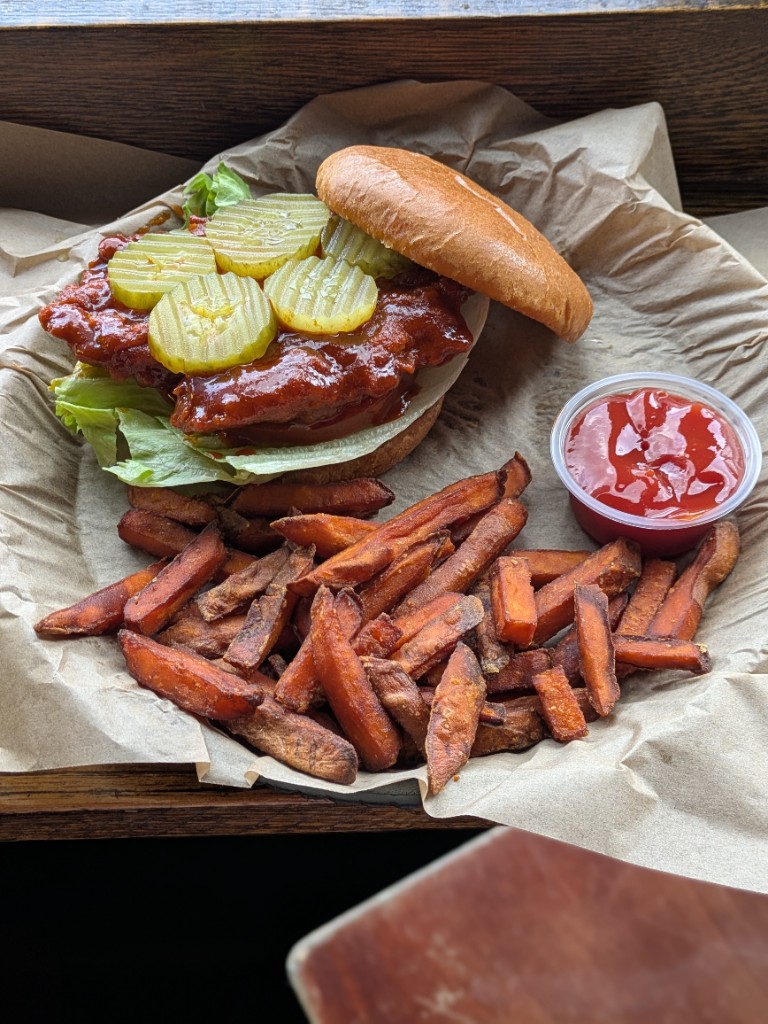 Nashville hot chicken sandwich with sweet potato fries